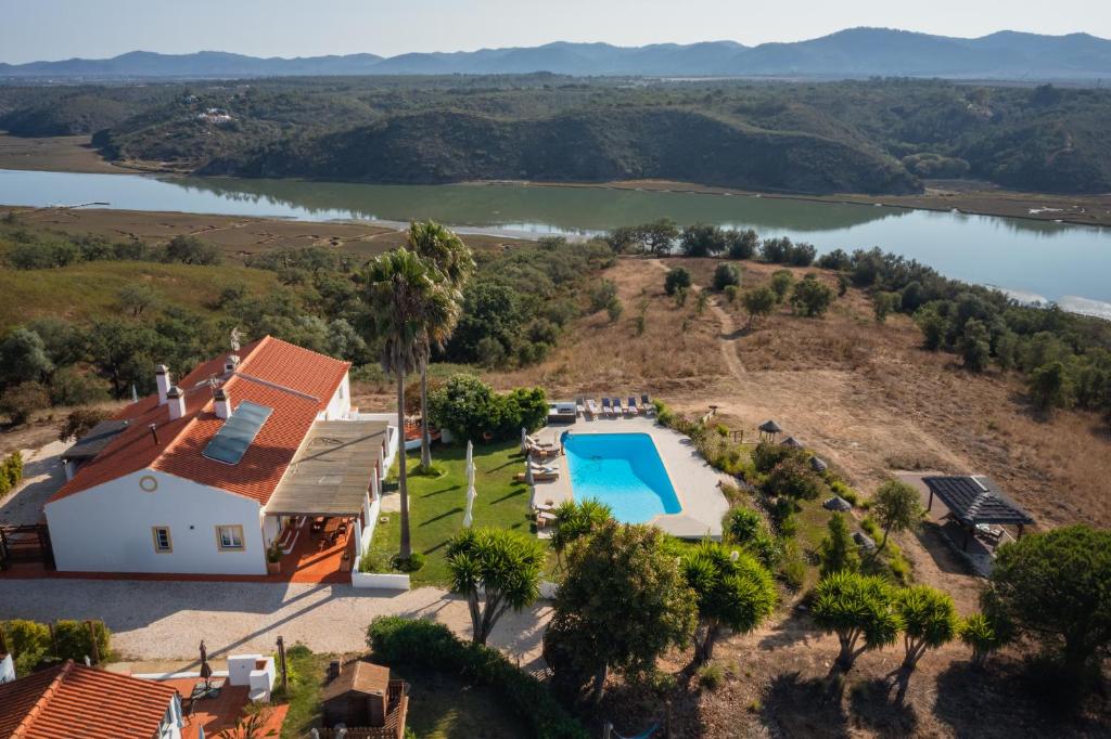 Monte do Zambujeiro country house surrounded by Alentejo olive groves and cork oaks