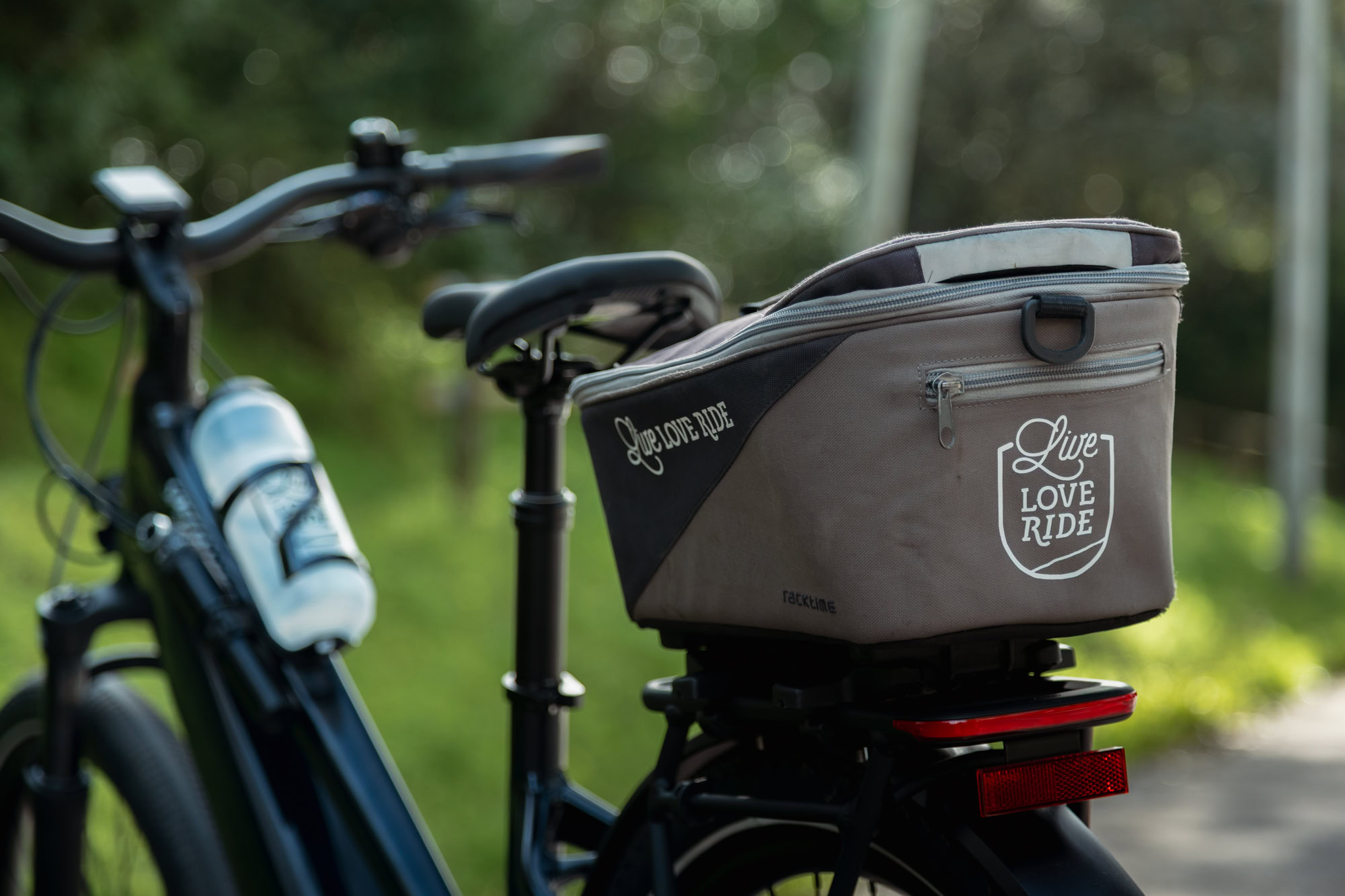 Live Love Ride touring bag mounted on Specialized Turbo Vado electric bike rack during e-bike tour